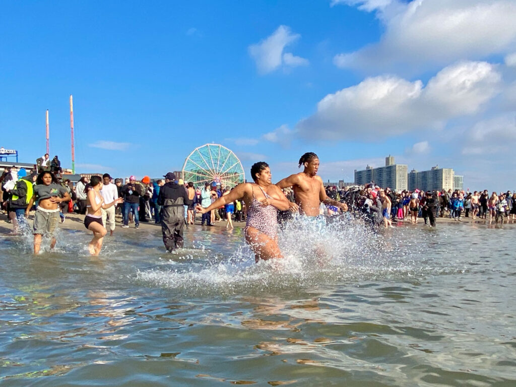 charging-into-the-icy-Atlantic-Waters-Coney-Island-Polar-Bear-New-Year's-Day-Plunge-2024-by-Dan-Turkewitz